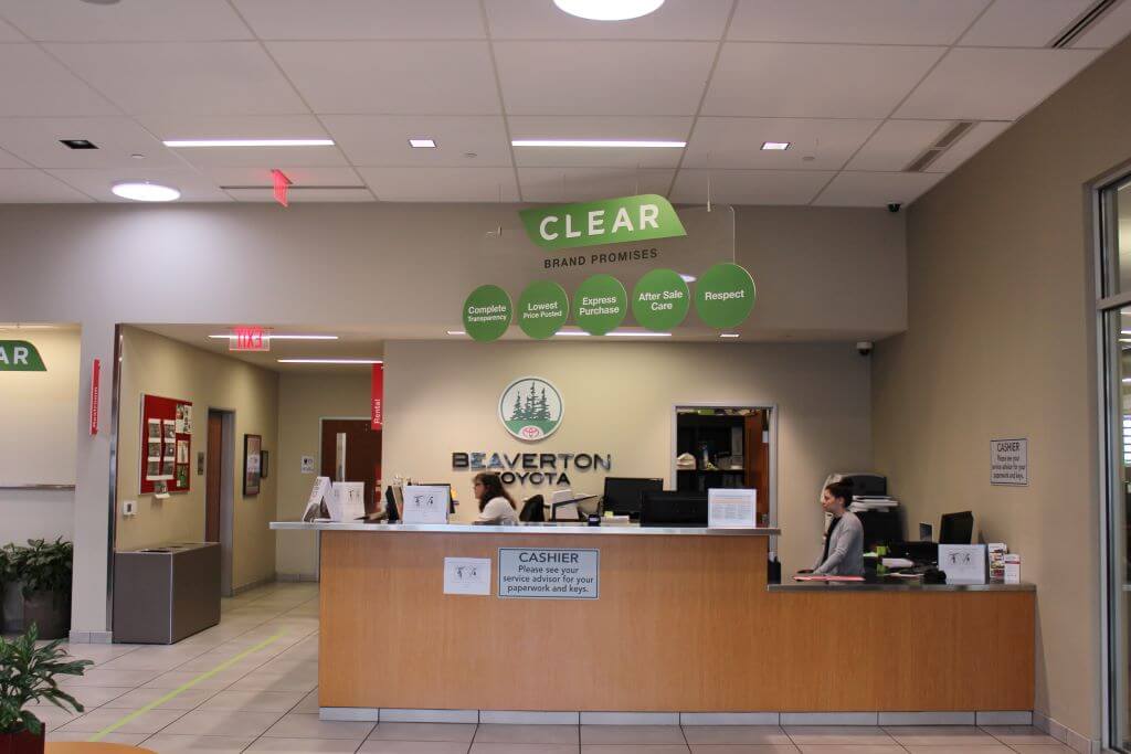 Beaverton Toyota Services desk with CLEAR sign.