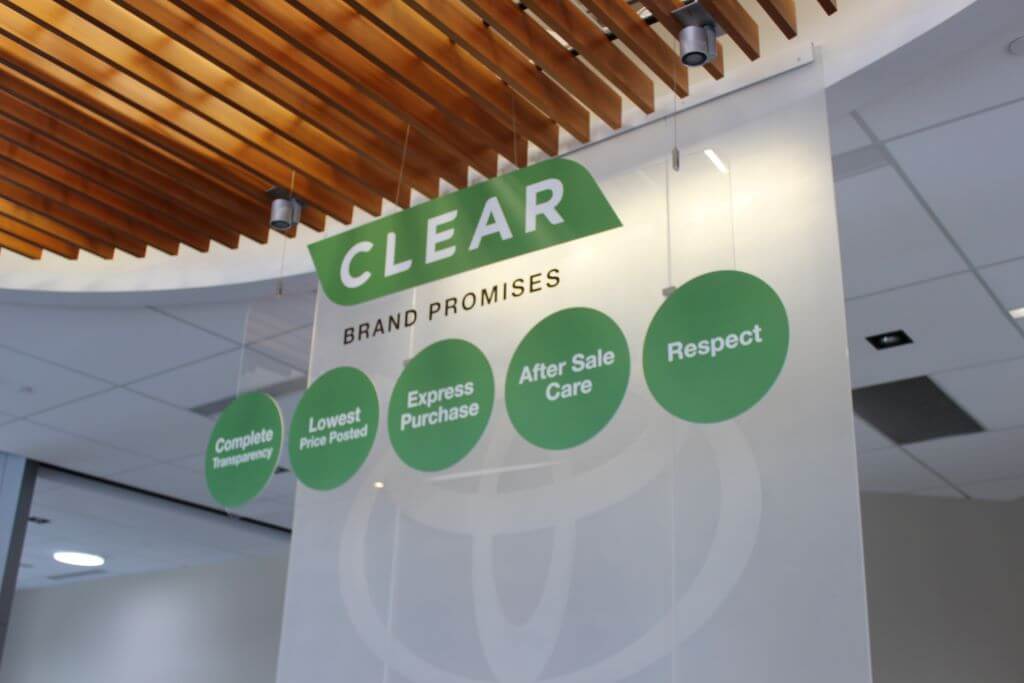 Green Beaverton Toyota CLEAR Care sign.