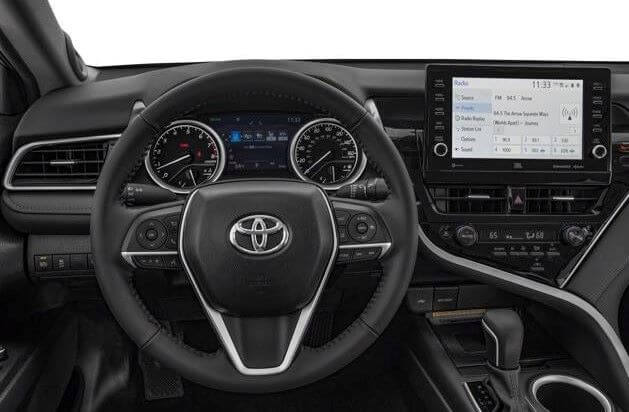 Menu screen with and dashboard with audio multimedia system of Toyota Camry.